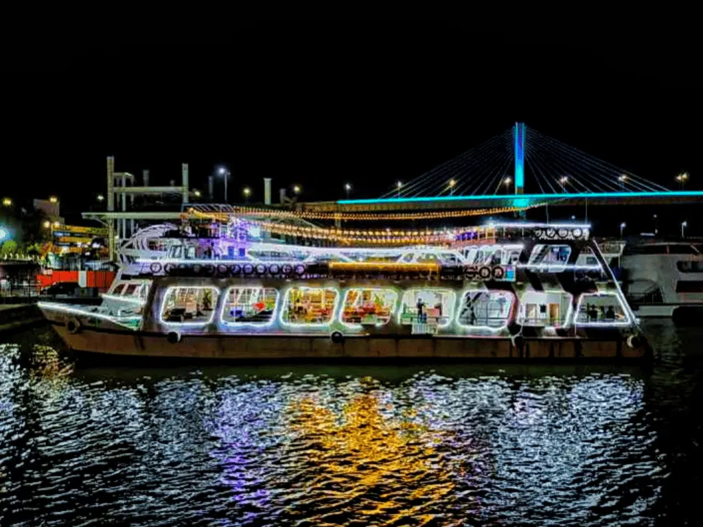 Princesa Dinner Cruise in Goa lit up at night, luxury boat on Mandovi River by Goa Tourist Taxi